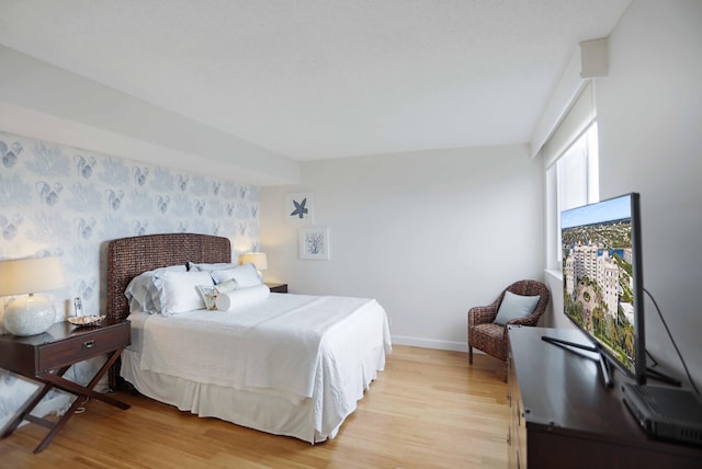 bedroom featuring light wood-type flooring