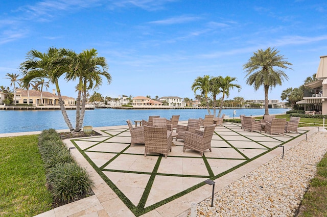 view of patio / terrace featuring outdoor lounge area and a water view