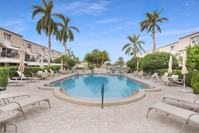 view of swimming pool featuring a patio area