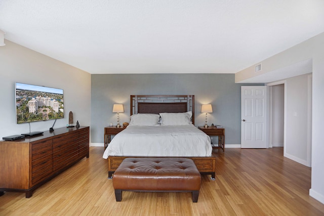 bedroom featuring light wood-type flooring