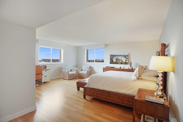 bedroom featuring hardwood / wood-style floors