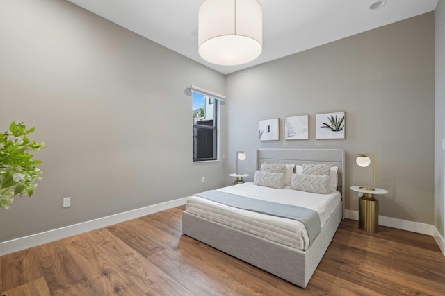 bedroom featuring wood-type flooring