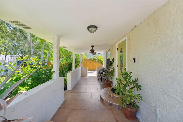 view of patio with ceiling fan