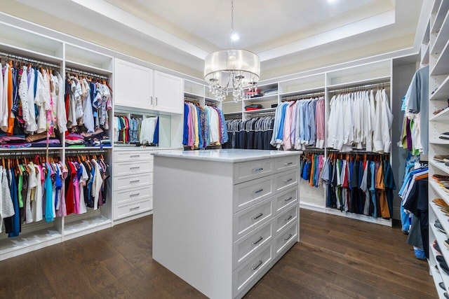 bathroom with walk in shower, vanity, a raised ceiling, and crown molding