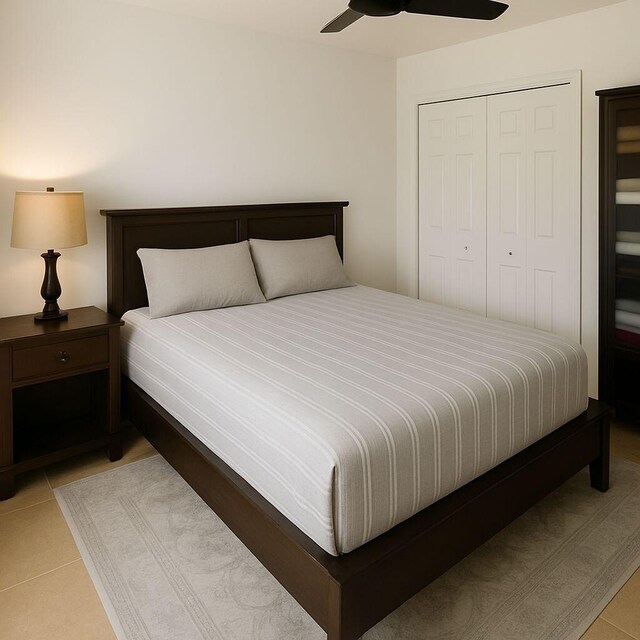 1202 Villa Cir, Boynton Beach, FL 33435 - tiled bedroom with a closet and ceiling fan