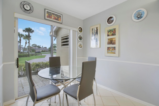 dining room with light tile patterned floors