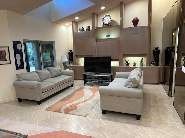 living room featuring high vaulted ceiling and light parquet floors