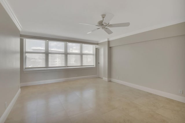 spare room featuring crown molding and ceiling fan