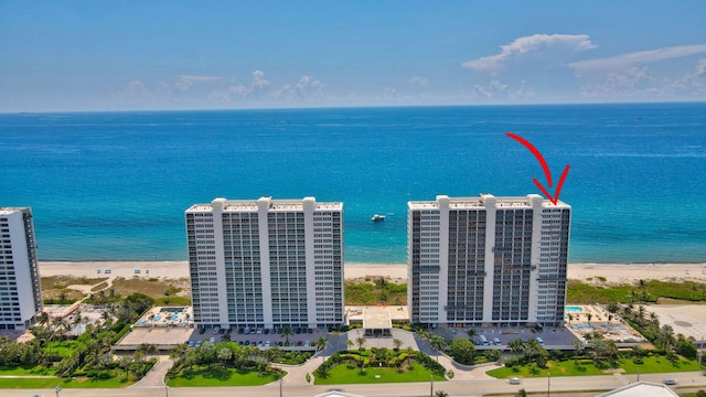 aerial view with a view of the beach and a water view