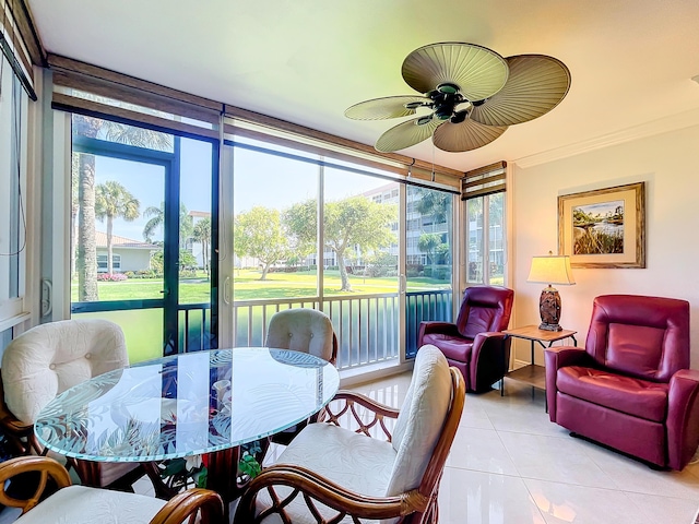 sunroom / solarium with ceiling fan and plenty of natural light