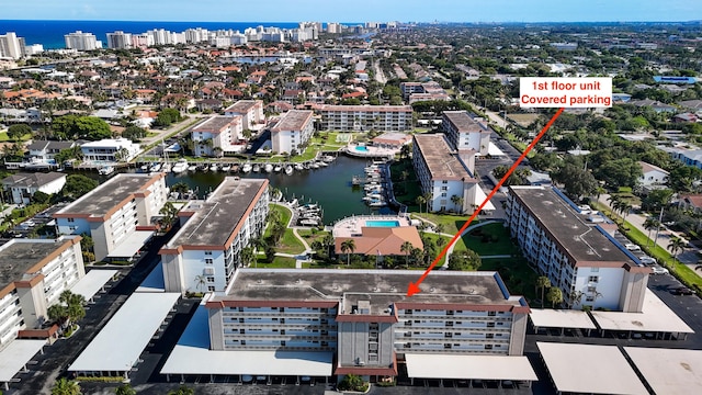 birds eye view of property featuring a water view