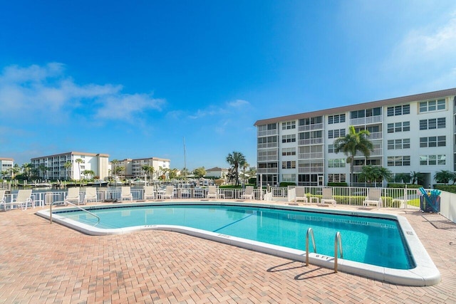 view of swimming pool with a patio area