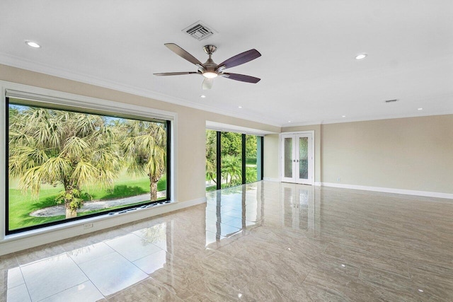 unfurnished room with ceiling fan, ornamental molding, and french doors