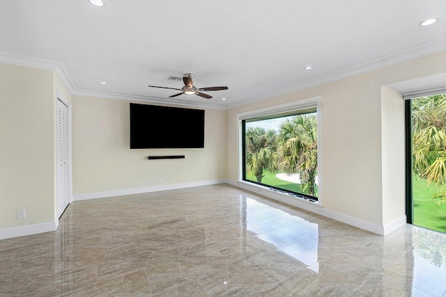 unfurnished room featuring a wealth of natural light, ornamental molding, and ceiling fan