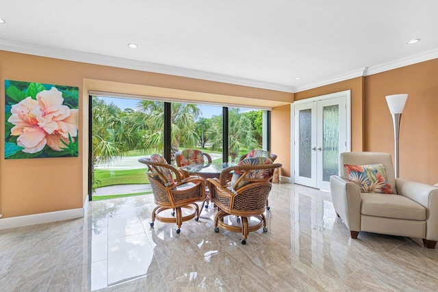 dining area featuring french doors and ornamental molding