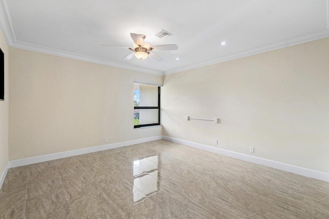 spare room featuring ceiling fan and ornamental molding