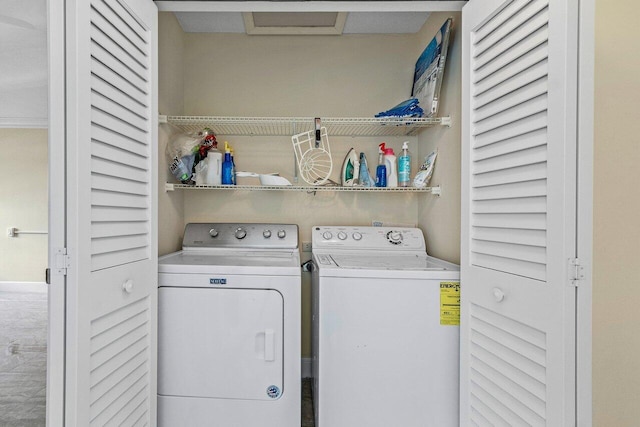 clothes washing area with independent washer and dryer