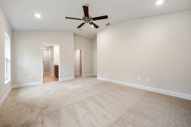 interior space with ceiling fan and lofted ceiling