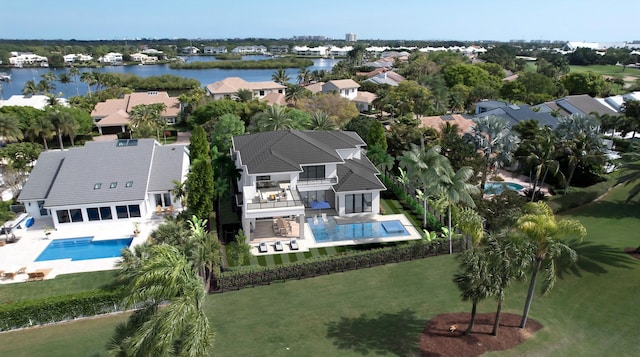 birds eye view of property featuring a water view