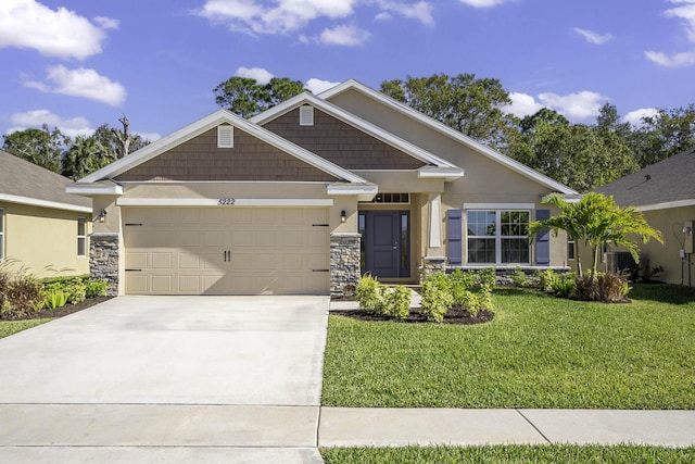 craftsman-style home with a front lawn and a garage