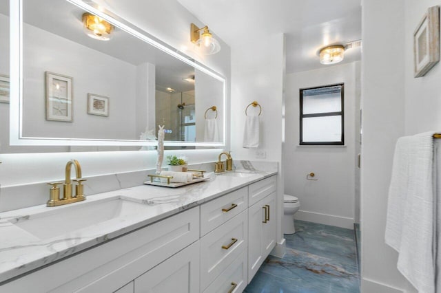 bathroom featuring an enclosed shower, vanity, and toilet