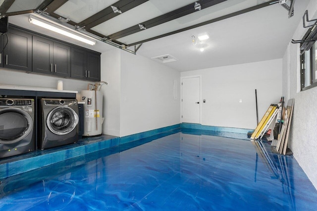 interior space featuring washer / dryer and electric water heater