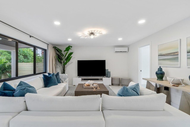 living room with a wall mounted air conditioner