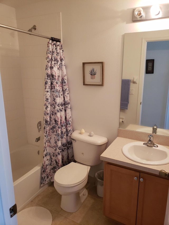 full bathroom with tile patterned floors, vanity, shower / bathtub combination with curtain, and toilet