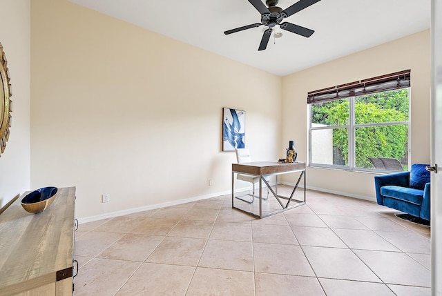 home office featuring ceiling fan and light tile patterned floors