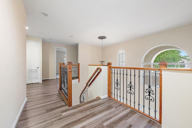 hallway with light wood-type flooring