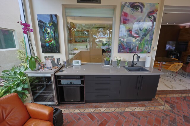 sunroom / solarium featuring a water view