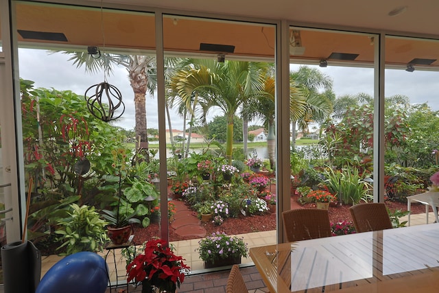 sunroom with a water view