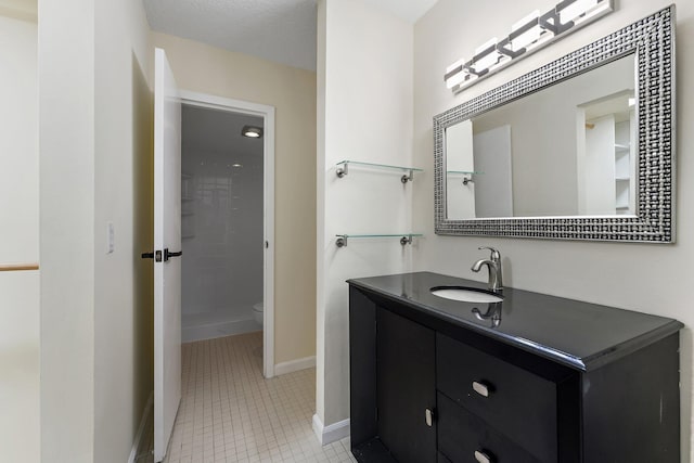 bathroom with walk in shower, vanity, and toilet