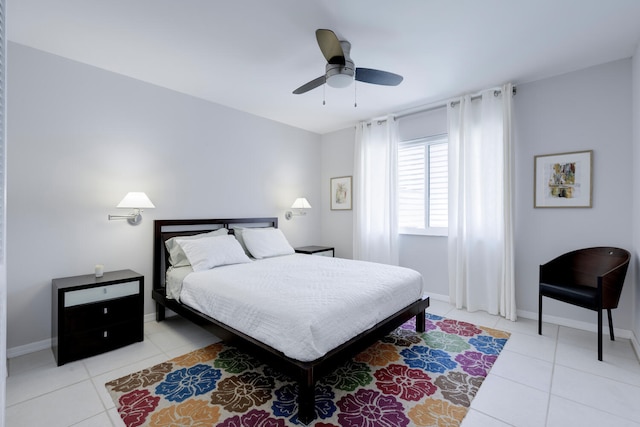 bedroom featuring ceiling fan and light tile patterned floors