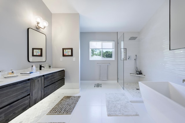 bathroom with tile patterned flooring, vanity, and separate shower and tub