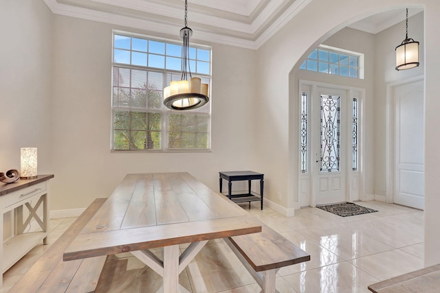 entryway featuring crown molding