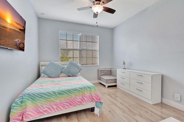 bedroom featuring ceiling fan and light wood-type flooring