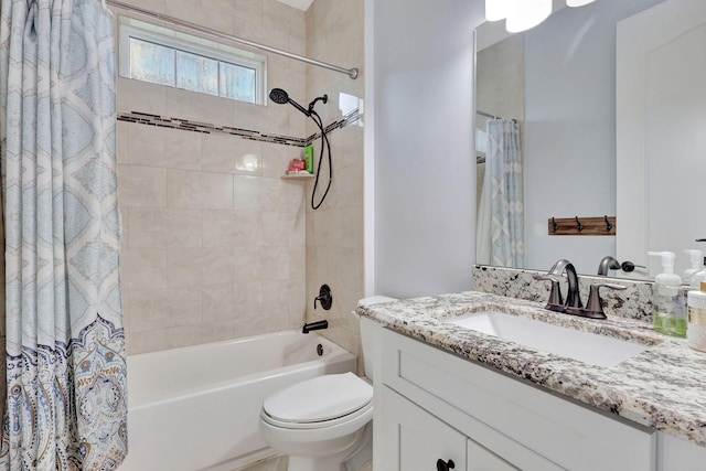 full bathroom featuring vanity, toilet, and shower / bathtub combination with curtain