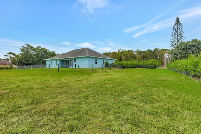 view of yard with fence