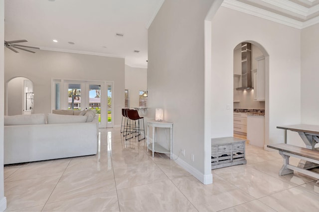 living room featuring french doors, ceiling fan, and ornamental molding