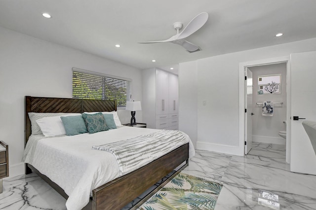 bedroom featuring ceiling fan and ensuite bathroom