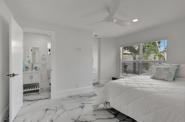 bedroom featuring ensuite bathroom and ceiling fan