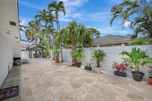 1001 W Palmetto Park Rd, Boca Raton, FL 33486 - view of patio / terrace with a gazebo and a fenced backyard