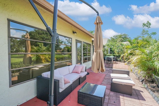 view of patio with an outdoor living space and outdoor dining space