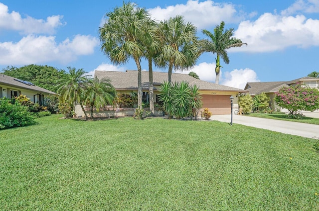 single story home with a front lawn and a garage