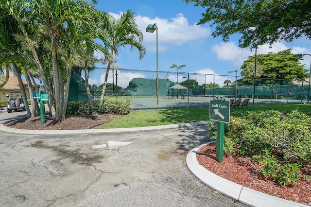 exterior space featuring tennis court