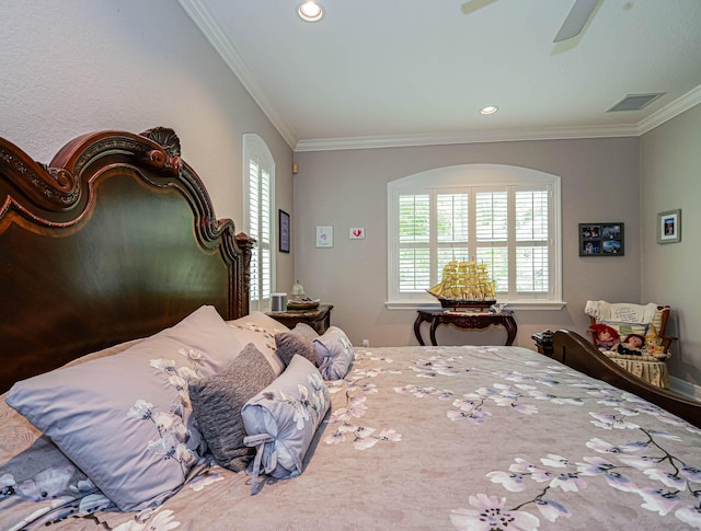 bedroom featuring ornamental molding and ceiling fan