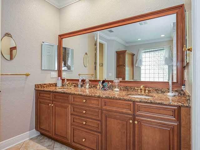 bathroom with tile flooring, double sink vanity, and ornamental molding