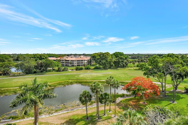 view of home's community featuring a yard and a water view