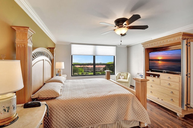 bedroom featuring ceiling fan, dark hardwood / wood-style flooring, and crown molding